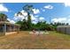 Backyard with fire pit and seating area at 1402 Viscaya Dr, Port Charlotte, FL 33952