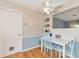 Small dining area with white table and light blue chairs at 1402 Viscaya Dr, Port Charlotte, FL 33952
