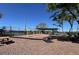 Community playground area with swings, covered play area, picnic tables, and lots of room for fun at 10957 Keys Gate Dr, Riverview, FL 33579