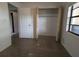 Bedroom with closet and neutral walls and carpet at 3931 E Eden Roc Cir, Tampa, FL 33634