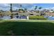 Dock with bench seating overlooking the waterfront at 3931 E Eden Roc Cir, Tampa, FL 33634
