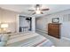 Well-lit bedroom with a large closet and ceiling fan at 10957 Keys Gate Dr, Riverview, FL 33579