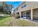 Private screened patio with a small yard at 10957 Keys Gate Dr, Riverview, FL 33579