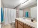 Bathroom with tub, shower, and wood vanity at 10957 Keys Gate Dr, Riverview, FL 33579