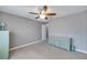 Bright bedroom with neutral walls and carpet flooring at 10957 Keys Gate Dr, Riverview, FL 33579