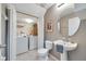 Clean bathroom with toilet, sink, and shower at 10957 Keys Gate Dr, Riverview, FL 33579