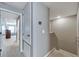 Upstairs hallway with access to bedrooms and bathroom at 10957 Keys Gate Dr, Riverview, FL 33579