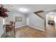 Light and airy dining area with hardwood floors and kitchen passthrough at 10957 Keys Gate Dr, Riverview, FL 33579