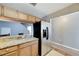 Kitchen features granite countertops and stainless steel refrigerator at 10957 Keys Gate Dr, Riverview, FL 33579