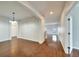 Formal dining room with hardwood floors and an arched entryway at 803 Parsons Pointe St, Seffner, FL 33584