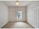 Spacious bedroom with large window and closet at 803 Parsons Pointe St, Seffner, FL 33584