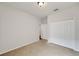 Simple bedroom with double door closet and carpet at 803 Parsons Pointe St, Seffner, FL 33584