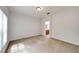 Well lit bedroom with carpet and access to bathroom at 803 Parsons Pointe St, Seffner, FL 33584