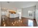 Spacious living room with hardwood floors and an open floor plan at 803 Parsons Pointe St, Seffner, FL 33584