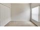 Simple bedroom with double door closet and carpet at 803 Parsons Pointe St, Seffner, FL 33584
