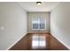 Bright office featuring hardwood floors and a window with blinds at 803 Parsons Pointe St, Seffner, FL 33584