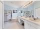 Bathroom with a double vanity, shower, and bathtub at 2128 W Del Webb Blvd, Sun City Center, FL 33573