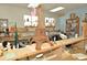 A dedicated craft room with a large wooden Eiffel Tower model and bookshelves at 2128 W Del Webb Blvd, Sun City Center, FL 33573