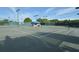 Tennis court with ample space for players at 2128 W Del Webb Blvd, Sun City Center, FL 33573