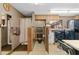 Convenient laundry room with washer, dryer, and built-in cabinets at 17501 Brown Rd, Odessa, FL 33556