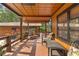 Spacious back porch with wooden deck and comfortable seating area at 17501 Brown Rd, Odessa, FL 33556