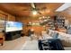 Relaxing living area with plush sofa, coffee table, and ceiling fan at 17501 Brown Rd, Odessa, FL 33556