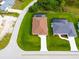 Two-house aerial view showing a home with a pool and driveway at 9187 Prospect Ave, Englewood, FL 34224