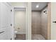 Bathroom with toilet and walk-in shower at 9187 Prospect Ave, Englewood, FL 34224