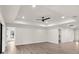 Bright and airy living room with high ceilings and ceiling fan at 9187 Prospect Ave, Englewood, FL 34224