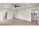 Spacious main bedroom with wood-look floors and access to other rooms at 9187 Prospect Ave, Englewood, FL 34224