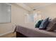 Spacious bedroom with a comfortable bed and plenty of pillows at 8403 Grand Estuary Trl # 106, Bradenton, FL 34212