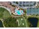 Tennis courts, pool, and golf course in community at 8403 Grand Estuary Trl # 106, Bradenton, FL 34212