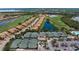 Community tennis courts and homes near golf course at 8403 Grand Estuary Trl # 106, Bradenton, FL 34212