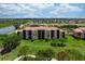 Condo building with balconies overlooking a golf course at 8403 Grand Estuary Trl # 106, Bradenton, FL 34212