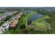 Community boasts lush landscaping and golf course views at 8403 Grand Estuary Trl # 106, Bradenton, FL 34212