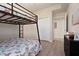 Bedroom with a bunk bed and ample closet space at 8403 Grand Estuary Trl # 106, Bradenton, FL 34212