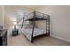 Bedroom with a bunk bed, ideal for guests or children at 8403 Grand Estuary Trl # 106, Bradenton, FL 34212