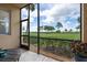Spacious screened porch with view of the golf course at 8403 Grand Estuary Trl # 106, Bradenton, FL 34212