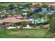 Aerial view of community amenities including pool, tennis courts, golf course, and clubhouse at 8403 Grand Estuary Trl # 106, Bradenton, FL 34212