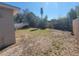 The spacious back yard is enclosed by a mix of wood and PVC fencing at 4305 E Deleuil Ave, Tampa, FL 33610