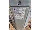 HVAC condenser unit details with the manufacturer's label visible at 4305 E Deleuil Ave, Tampa, FL 33610