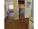 View of the kitchen leading to the unfinished basement at 4305 E Deleuil Ave, Tampa, FL 33610