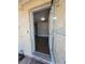 View from front door into the living room with modern lighting and wood floors at 4305 E Deleuil Ave, Tampa, FL 33610