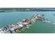 Beautiful waterfront homes with docks and boat access, offering a serene coastal living experience at 831 Bay Point Dr, Madeira Beach, FL 33708