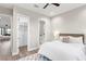 Comfortable bedroom featuring neutral walls, carpet, and ensuite bath and closet at 831 Bay Point Dr, Madeira Beach, FL 33708