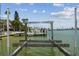 This property has a private boat lift for easy access to the water and recreational activities at 831 Bay Point Dr, Madeira Beach, FL 33708