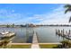 Beautiful waterfront view from property with a dock with access to open water at 831 Bay Point Dr, Madeira Beach, FL 33708