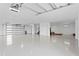 This spacious garage features high ceilings and plenty of room for vehicles at 831 Bay Point Dr, Madeira Beach, FL 33708