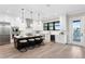 Modern kitchen featuring a large island and stainless steel appliances at 831 Bay Point Dr, Madeira Beach, FL 33708