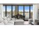 Bright living room with views of the intercoastal waterway at 831 Bay Point Dr, Madeira Beach, FL 33708